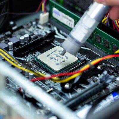 Thermal paste is applied to the laptop processor